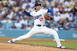 Shohei Ohtani picks up first win as Dodger in nine-strikeout outing